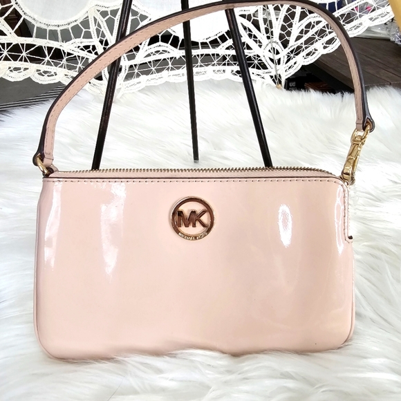 MICHAEL Michael Kors Handbags - 🆑️ MICHAEL Michael Kors Pale Pink Wristlet Golden Metal Hardware Patent Leather